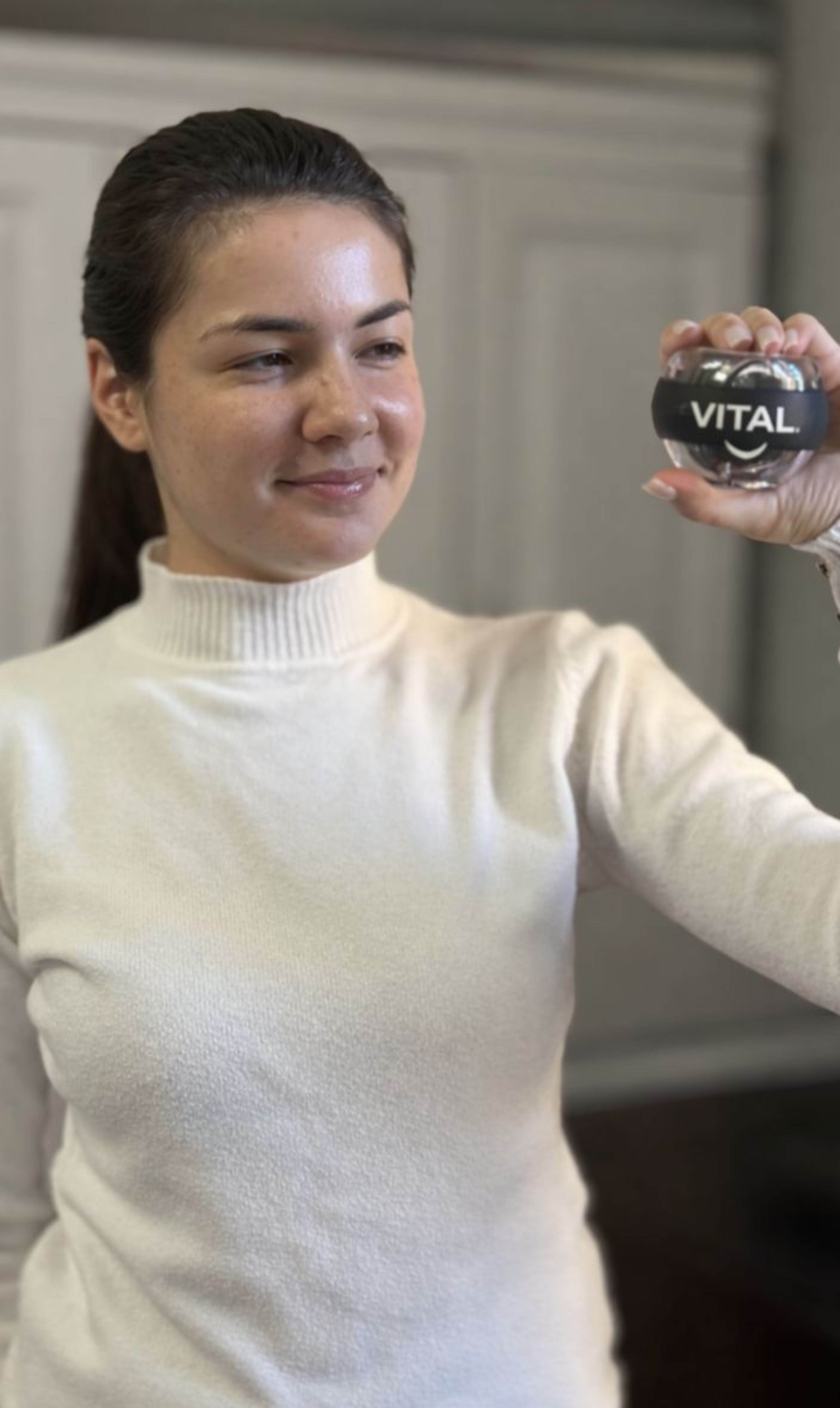 girl showing vital wrist ball